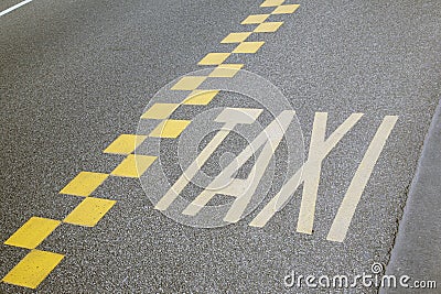 Yellow Taxi Sign in Brussels Stock Photo