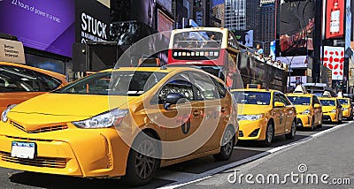 Yellow Taxis in Times Square Editorial Stock Photo