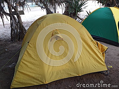 Yellow Tent at outside seashores in the daylight Stock Photo