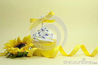 Yellow theme cupcake with sunflower Stock Photo