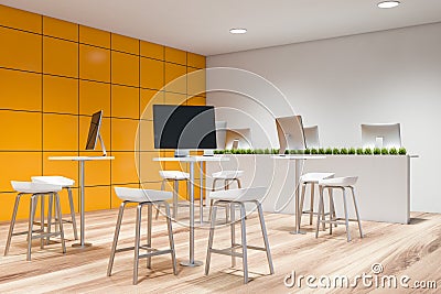 Yellow tile coworking style office corner Stock Photo