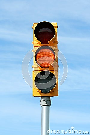 Yellow traffic signal light Stock Photo