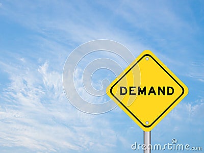 Yellow transportation sign with word demand on blue sky Stock Photo