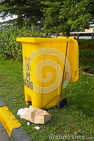 Yellow trash with bag from paper Editorial Stock Photo