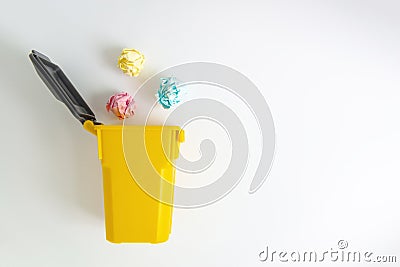 Yellow trash with garbage on white screen for save the world concept Stock Photo