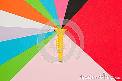 yellow trumpet on colorful abstract background, creative art design Stock Photo