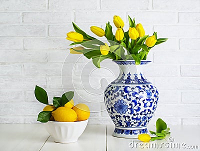 Yellow tulips in the chinese vase Stock Photo