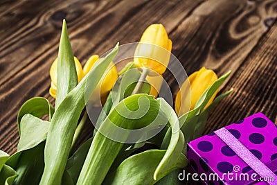 Yellow tulips and gift box Stock Photo