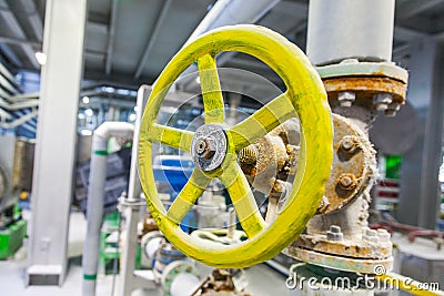 Yellow valve on the pipe Chemical industry Stock Photo