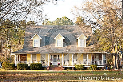 Yellow Victorian Style Home Stock Photo
