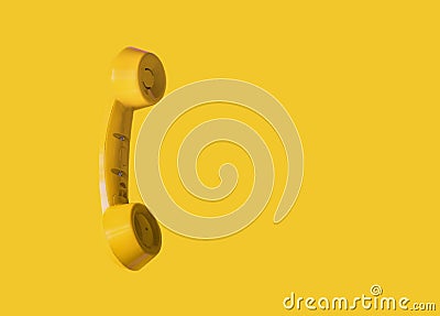 Yellow vintage telephone handset, retro style Stock Photo