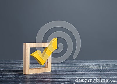 Yellow voting tick in a checkbox. Democratic institutions, vote on democratic elections, referendum. Opinion Poll. Make right Stock Photo