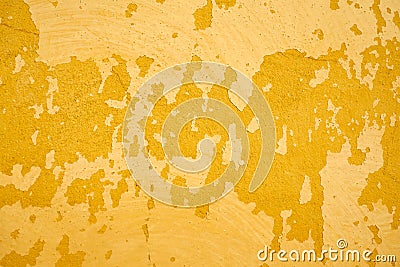 Yellow wall with old cracked paint. Stock Photo