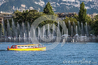 Yellow water tram in Geneva, Switzerland Editorial Stock Photo