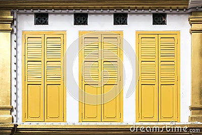 Yellow window doors Stock Photo