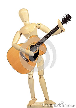 Yellow wooden dummy play guitar action Stock Photo