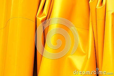 Yellow wrinkled tarpaulin background Stock Photo