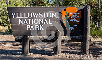 Yellowstone National Park sign at the West Entrance in Montana Editorial Stock Photo