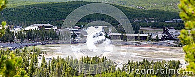 Yellowstone, Wyoming, USA, May, 25, 2021, tourists in the Upper Geyser Basin watching Old Faithful erupt Editorial Stock Photo