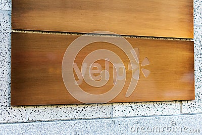 Yelp sign and logo at headquarters. Company develops, hosts, and markets the Yelp.com website and the Yelp mobile app, for crowd- Editorial Stock Photo