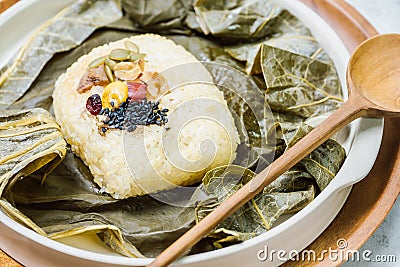 yeonnipbap, korean lotus leaf rice, Glutinous rice, dates, and chestnuts wrapped in a lotus leaf and steamed in a steamer. In the Stock Photo