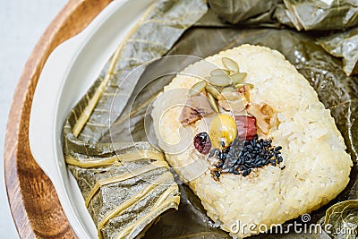 yeonnipbap, korean lotus leaf rice, Glutinous rice, dates, and chestnuts wrapped in a lotus leaf and steamed in a steamer. In the Stock Photo