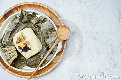 yeonnipbap, korean lotus leaf rice, Glutinous rice, dates, and chestnuts wrapped in a lotus leaf and steamed in a steamer. In the Stock Photo