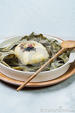 yeonnipbap, korean lotus leaf rice, Glutinous rice, dates, and chestnuts wrapped in a lotus leaf and steamed in a steamer. In the Stock Photo