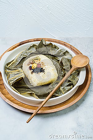 yeonnipbap, korean lotus leaf rice, Glutinous rice, dates, and chestnuts wrapped in a lotus leaf and steamed in a steamer. In the Stock Photo
