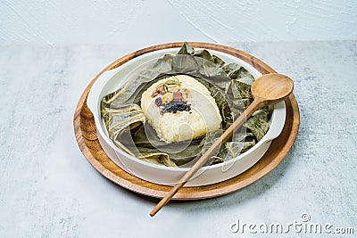 yeonnipbap, korean lotus leaf rice, Glutinous rice, dates, and chestnuts wrapped in a lotus leaf and steamed in a steamer. In the Stock Photo