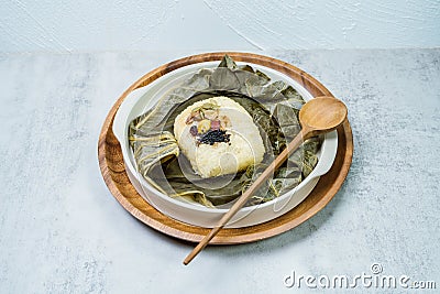 yeonnipbap, korean lotus leaf rice, Glutinous rice, dates, and chestnuts wrapped in a lotus leaf and steamed in a steamer. In the Stock Photo