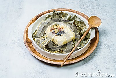 yeonnipbap, korean lotus leaf rice, Glutinous rice, dates, and chestnuts wrapped in a lotus leaf and steamed in a steamer. In the Stock Photo