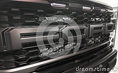 Yerevan, Armenia, August 18, 2023: Ford F-150 Raptor radiator grill and bumper with logo Ford close up. F-series ford pickup truck Editorial Stock Photo