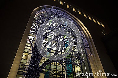 Yerevan, Armenia - March 8, 2023: Brightly lit Ameriabank main office building in the center of Yerevan in the evening. Editorial Stock Photo