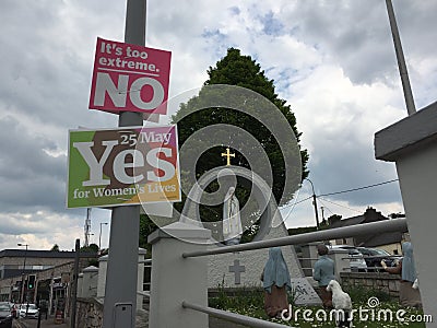 Yes and No posters for the 25th of May referendum regarding the issue of abortion, near the Fatima and the three little shepherds Editorial Stock Photo