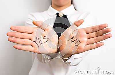 Yes or No? Words on businesswoman hands Stock Photo