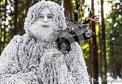 Yeti fairy tale character in winter forest. Outdoor fantasy photo. Stock Photo