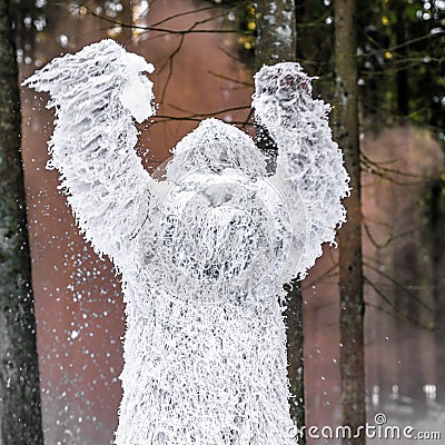 Yeti fairy tale character in winter forest. Outdoor fantasy photo. Stock Photo