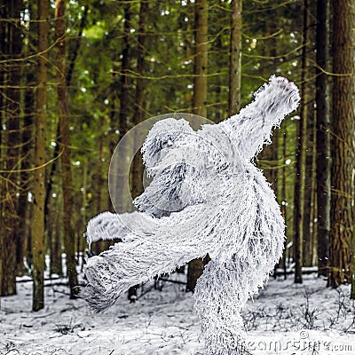 Yeti fairy tale character in winter forest. Outdoor fantasy photo. Stock Photo