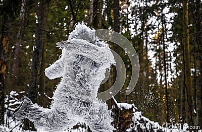 Yeti fairy tale character in winter forest. Outdoor fantasy photo. Stock Photo