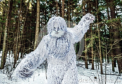 Yeti fairy tale character in winter forest. Outdoor fantasy photo. Stock Photo