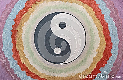 Yin Yang Spiritual Symbol, chakra healing painted decoration, handmade Stock Photo