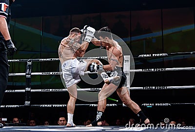 Ying Pengpeng of China and Richard Fanous of Australia in Thai Fight `Proud to be Thai` Editorial Stock Photo