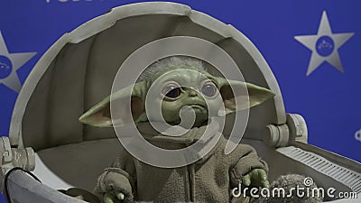 Yoda from Star Wars universe. HDR. Moving model of movie character in reality. Cyber figure of moving fantasy hero to Editorial Stock Photo