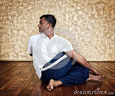 Yoga ardha matsiendrasana twist pose Stock Photo