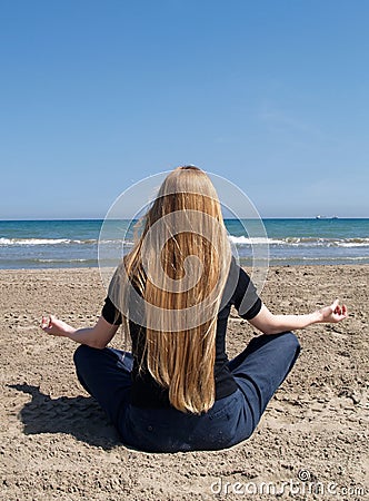 Yoga at the beach Editorial Stock Photo