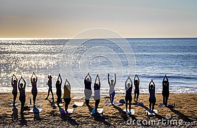 Yoga on the Beach Editorial Stock Photo