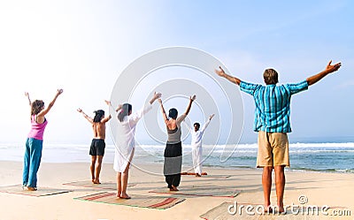 Yoga Class By The Beach Stock Photo