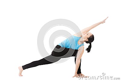 Yoga female in asana parivritta parshvakonasana Stock Photo
