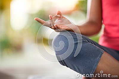 Yoga hand position during meditation Stock Photo